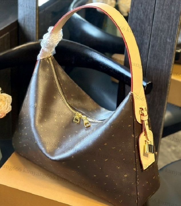 Designer Explosion New Womens Key Hobo M24856 Handbag Black Grained Calfskin Suede Lining Hook Closure Padlock Fashionably Slouchy Silhouette - Image 1