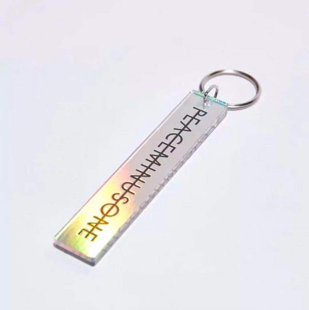 New peaceminusone chrysanthemum embroidery hip hop Reflective light Personalized fashion key chain - Image 1
