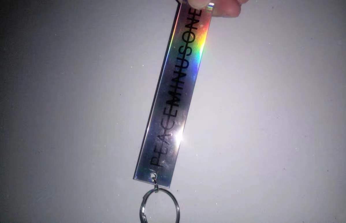 New peaceminusone chrysanthemum embroidery hip hop Reflective light Personalized fashion key chain - Image 3