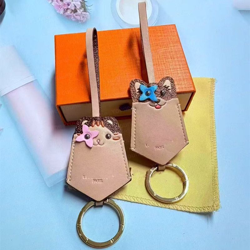 Designers Lou Dog Cat Keychains - Luxury Leather Bag Charm with Monogram Flower Eye - Womens Car Key Chain Pendant Jewelry Buckle Lanyard - Image 1