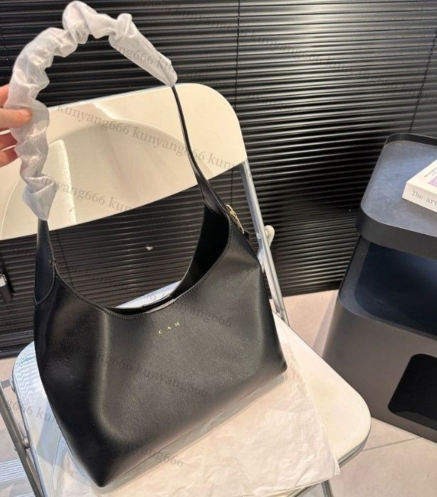 Designer brooklyn Explosion New Womens Key Hobo Handbag Black Grained Calfskin Suede Lining Hook Closure Padlock Fashionably Slouchy Silhouette - Image 3