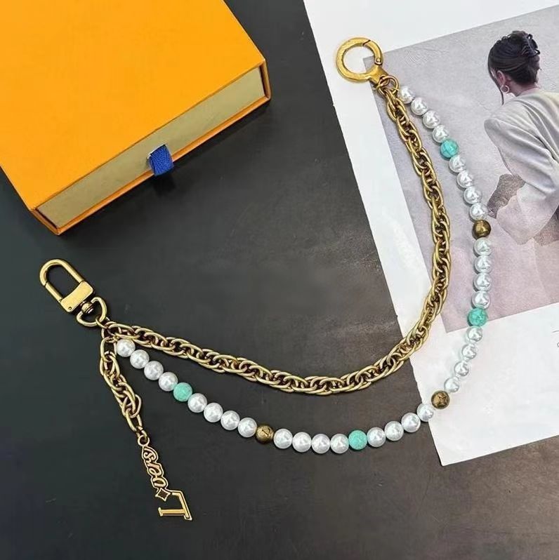 Womens Designer Bag Charm For Women Pearl Gold Silver Chain Luxury Mens Keychain Key Ring Purse Charm Bag Charms 3 Colors - Image 1