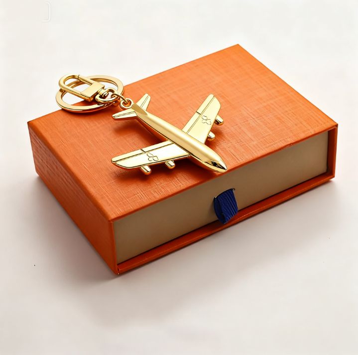 Keychains Lanyards with Leather Airplane Key Holder - Classic Designer Wallet Keychain Bag Charm Pendant for Women and Girls - Image 1