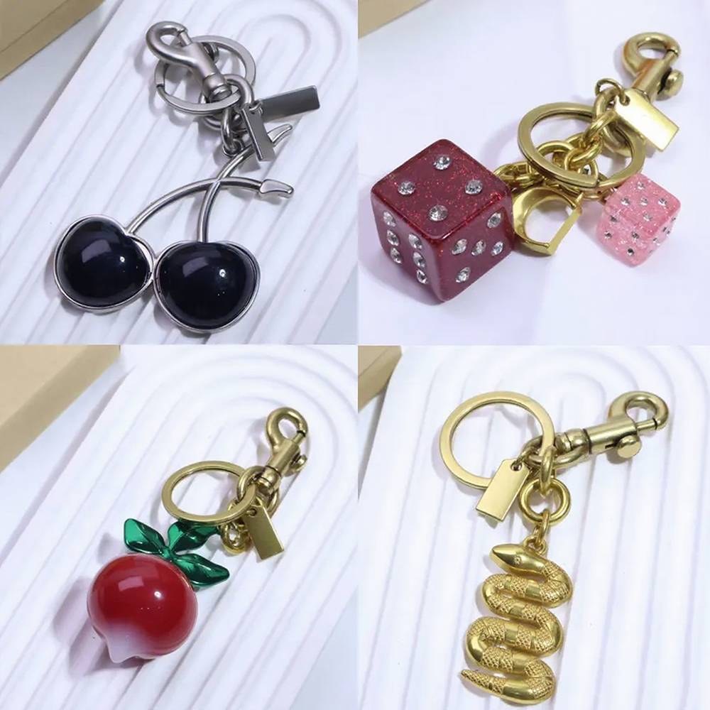 Luxury Fruit Keychain For Womens Cherry Bag Charm Brand Designer Key Ring Womens Bag Pendant Flower Letters Buckle Car Keychains Handmade Key Chain Bracelet - Image 1