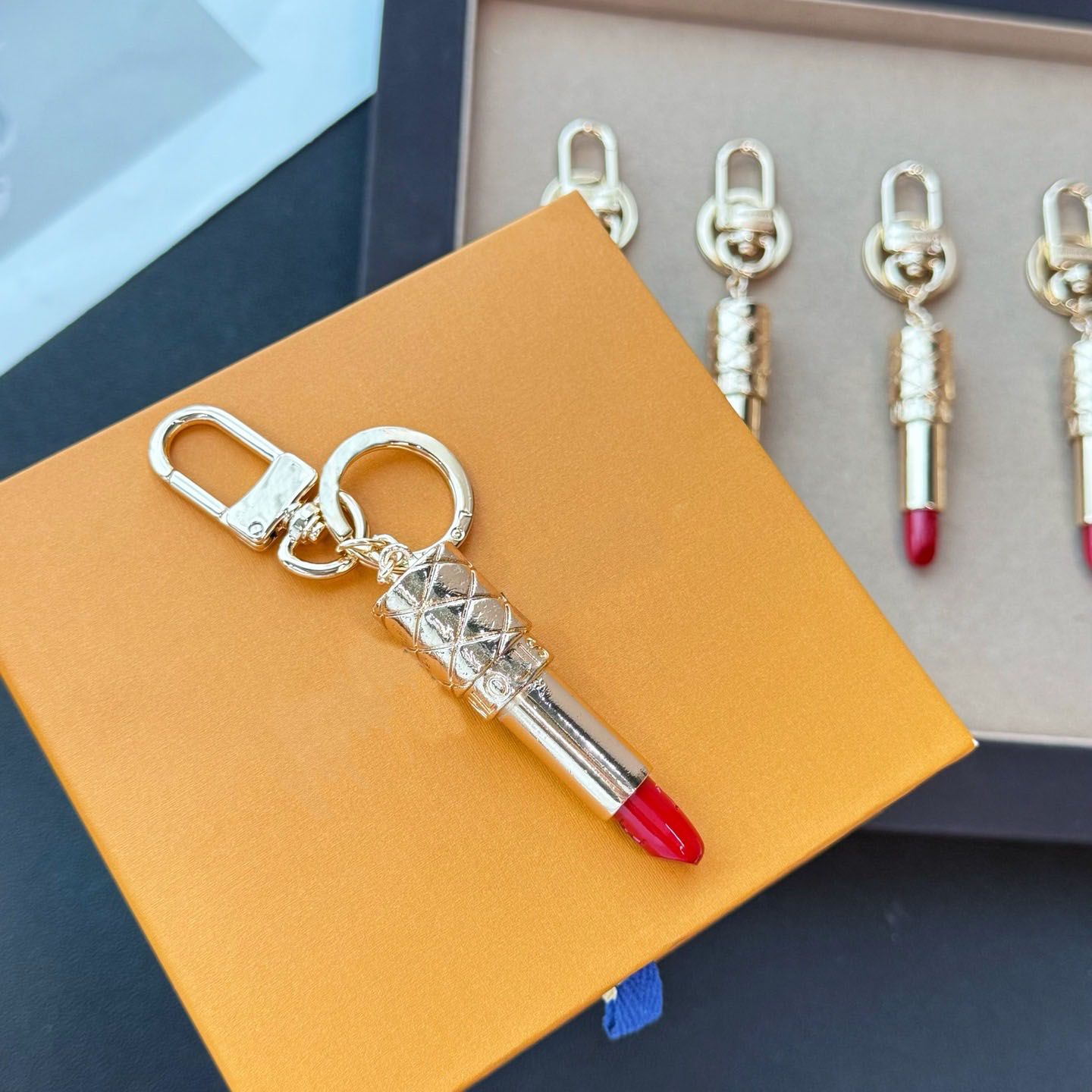 New Luxury Lipstick Keychains 18K Gold Lipstick Car Keyring Charms Fashion Designer Lanyards Key Rings Bags Pendant High Quality Accessories - Image 1