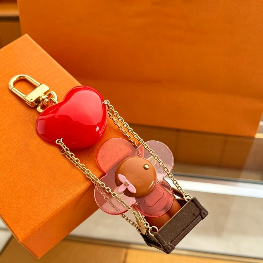 Designer Sunflower Swing shape Holidays Key Holder Luxury Summer Keychain Keying Bag Charms With Colorour Letter Pendant Fashion Cartoon Womens Bag Key chain - Image 1