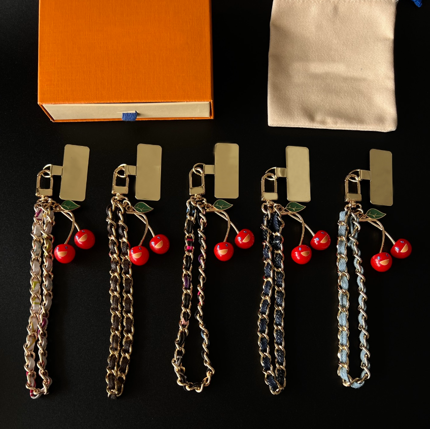 Designer Keychain Luxury Cherry Flower Clover Bag Charm Pendant Keychains Cherry Denim Lanyards Gold Chain Key Ring For Women Men Hanging Chain Pendant gift - Image 1