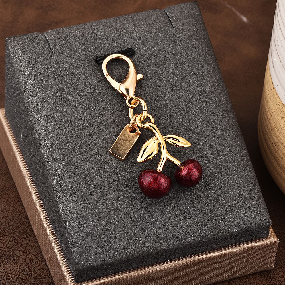 Designer Bag Charm Fashion Womens Keychain Dinosaur Cherry Alphabet Vintage Cool Pattern Refreshing Style Keyring Hangings key chain women dhgate - Image 4